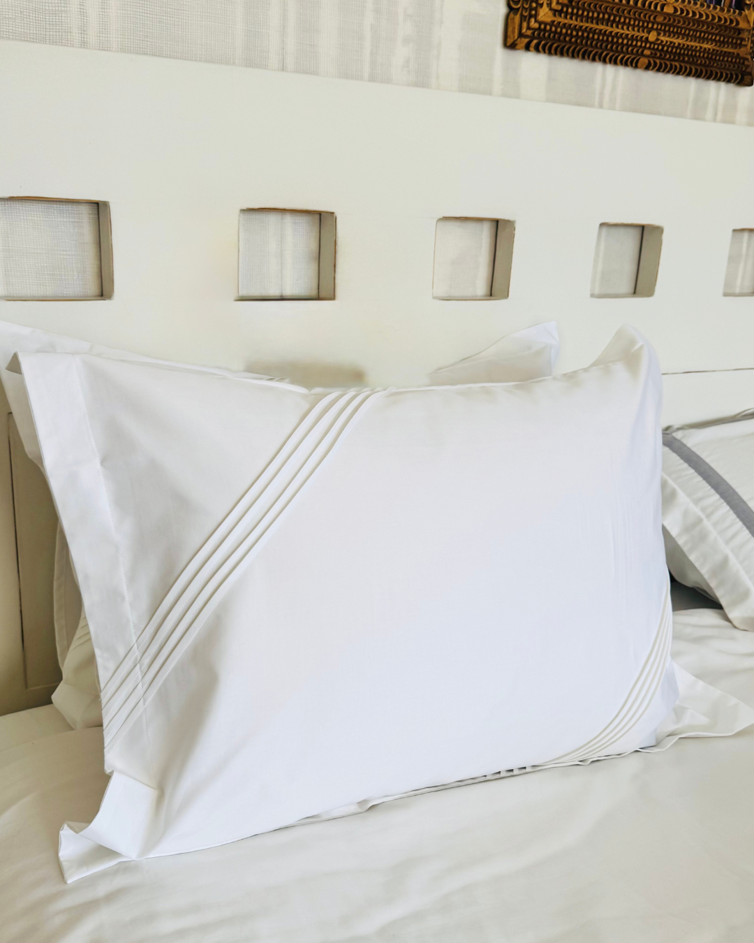 Par de fundas de almohadón blanco